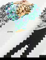 model wearing Jovani 06844 Print top with butterfly print and long sleeves