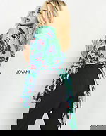 model wearing Jovani 06844 Print top with butterfly print and long sleeves