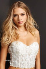 Front view of Jovani 06856 crop top with floral details.