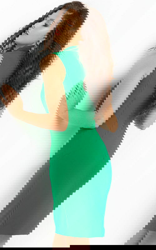 Model wearing 06975 elegant green dress, back view showing the fitted cut.