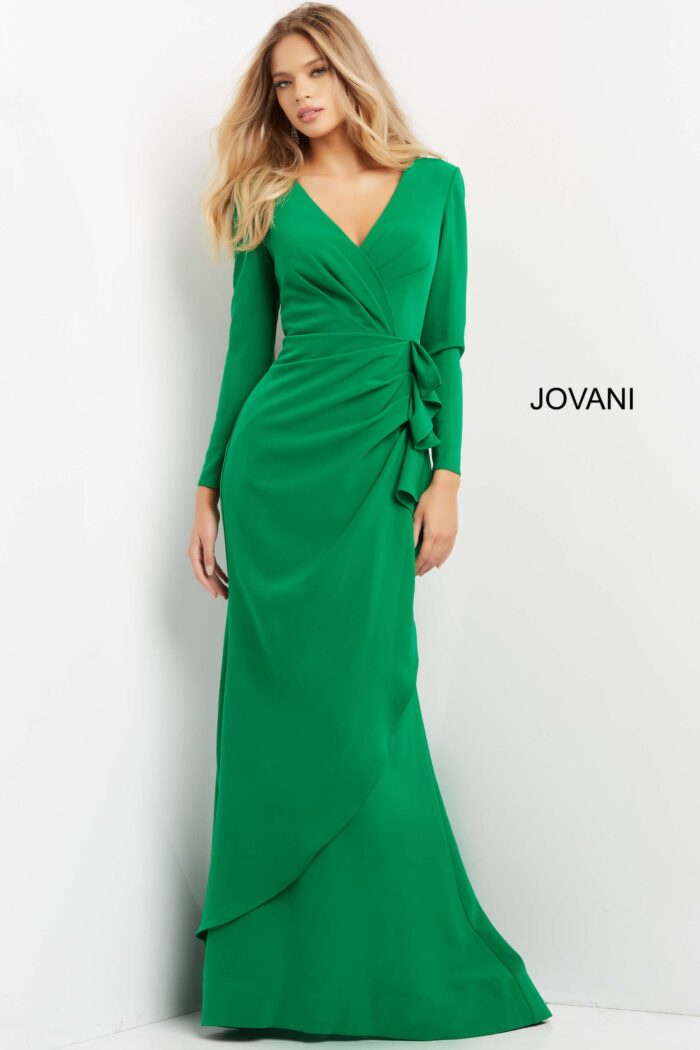 model wearing Jovani 06995 in emerald green front view with V-neckline and ruffle detail