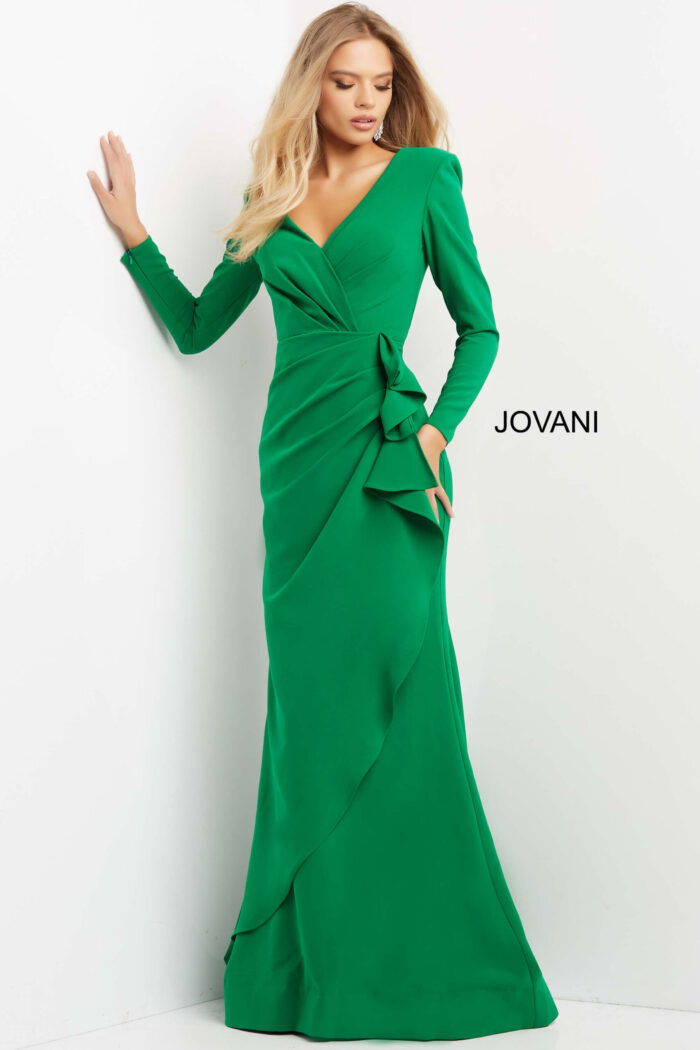 Model displaying Jovani 06995 emerald dress with elegant ruffled detail.
