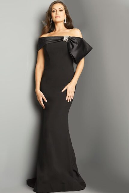 Model wearing Jovani 07014 black dress with bow detail.