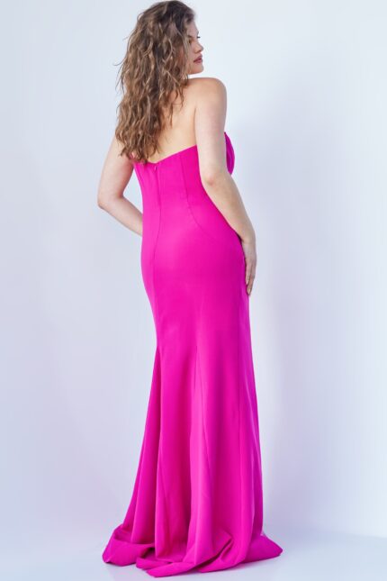 Model displaying Jovani 07306 fuchsia gown, front perspective with neckline and bow detail