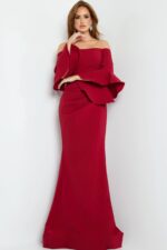 Model in Jovani 07065 cranberry gown, showcasing the off-the-shoulder neckline and elegant body-hugging fit.