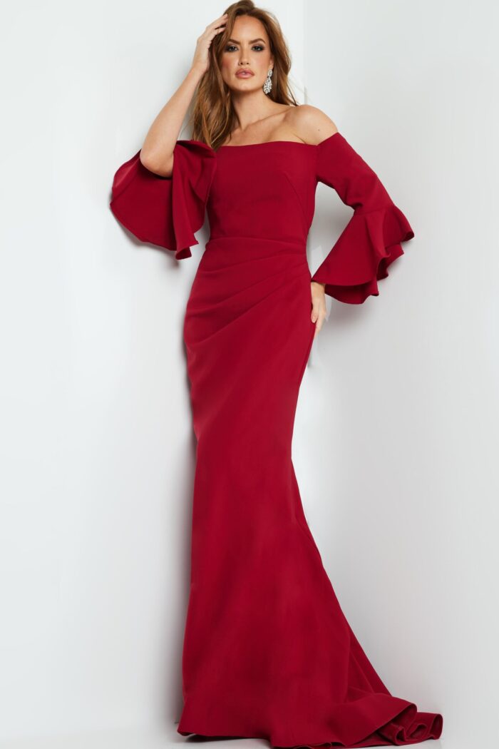 Front view of model wearing Jovani 07065 cranberry dress with off-the-shoulder neckline and dramatic sleeves.