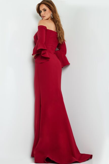 Back view of model wearing Jovani 07065 cranberry dress with off-the-shoulder design and flared sleeves.