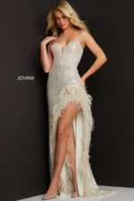model wearing Jovani 07068 beige sequin gown with feather accents and high slit