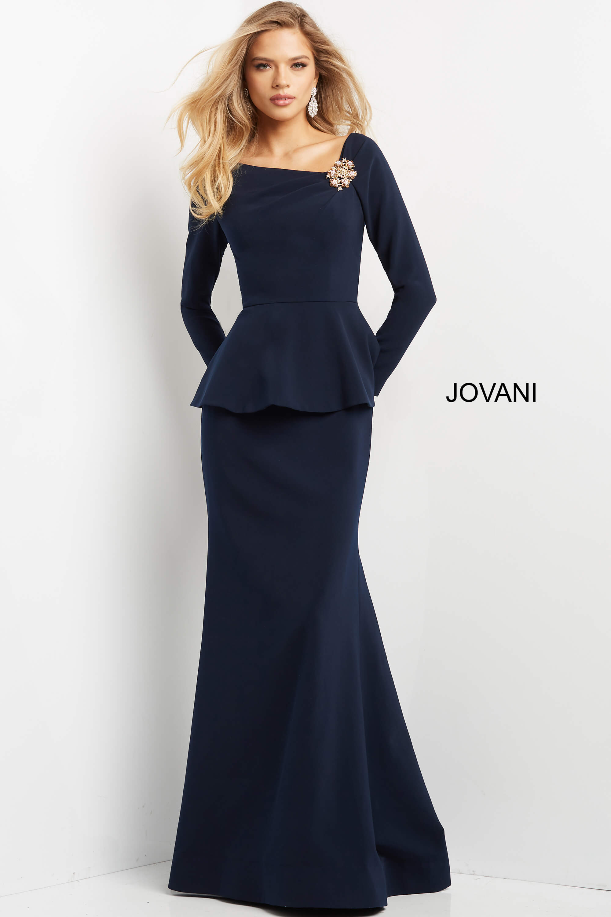 07131-Navy-2011.jpg Model wearing Jovani 07131 navy dress with off-the-shoulder neckline and peplum waist.