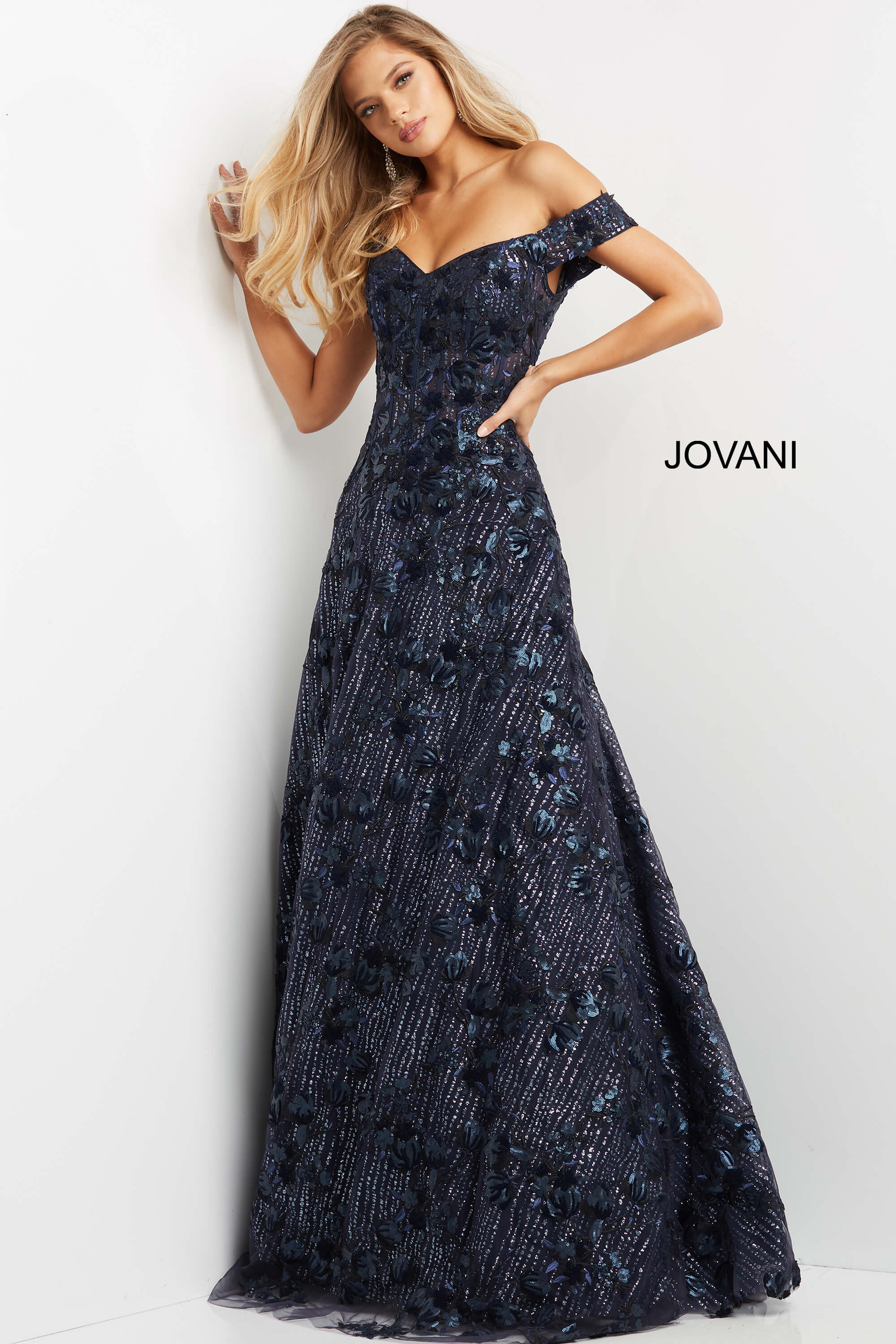 07162-Navy-3.jpg Model wearing Jovani 07162 navy off-the-shoulder gown, front view.