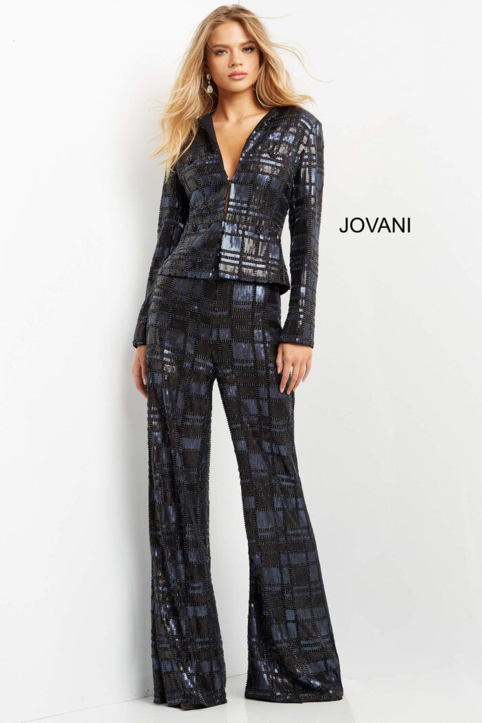 Model wearing Jovani 07166 navy suit detailed with shimmering sequins, front view