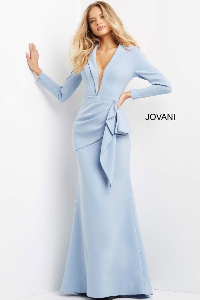 Model in Jovani 07242 periwinkle blue dress showing V-neckline and bow detail.