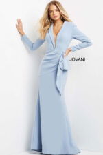 Model showing Jovani 07242 periwinkle blue dress with deep V-neck and bow.