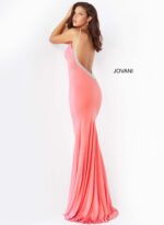 Model wearing Jovani 07297 in hot pink, side view.