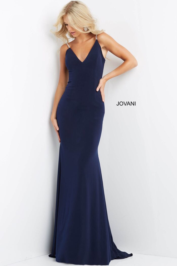Model wearing Jovani 07297 in navy, front view.
