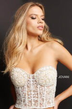 model wearing Jovani 07411 off-white top from the front view.