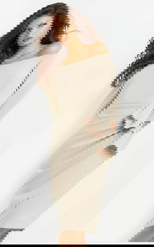 Model wearing Jovani 07442 beige off-the-shoulder dress with three-quarter sleeves and draped waist detail.