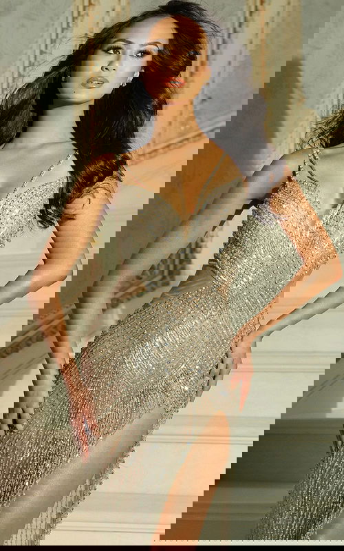 Close-up of crystal beadwork and illusion detailing on bodice