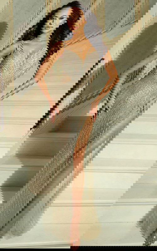 Close-up of crystal beadwork and illusion detailing on bodice