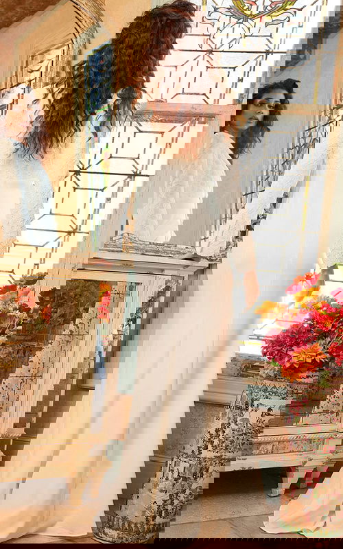 Back view of Jovani 07552 ivory dress, highlighting lace design.