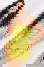 Model wearing Jovani 07807 lime dress with strapless neckline