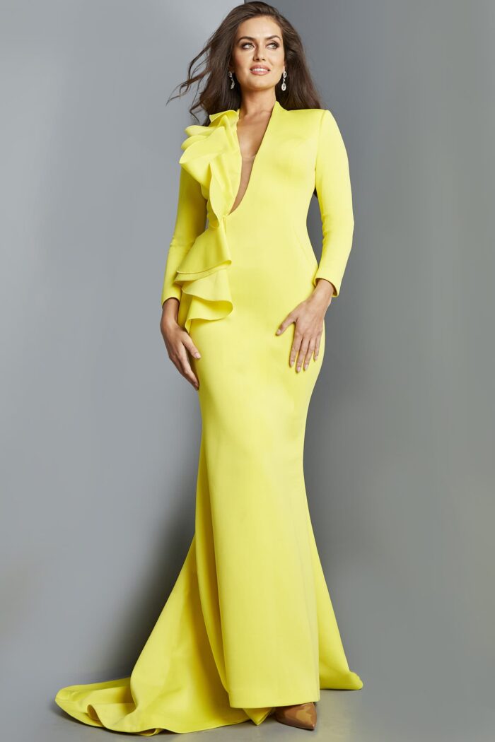 Model showcasing Jovani 07934 yellow gown with deep V-neckline, front view