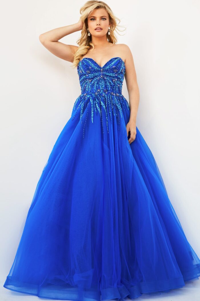 Model wearing Jovani 07946 royal blue floor-length ball gown with beaded bodice from the front