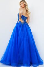 Model showcasing the back of Jovani 07946 royal blue ball gown