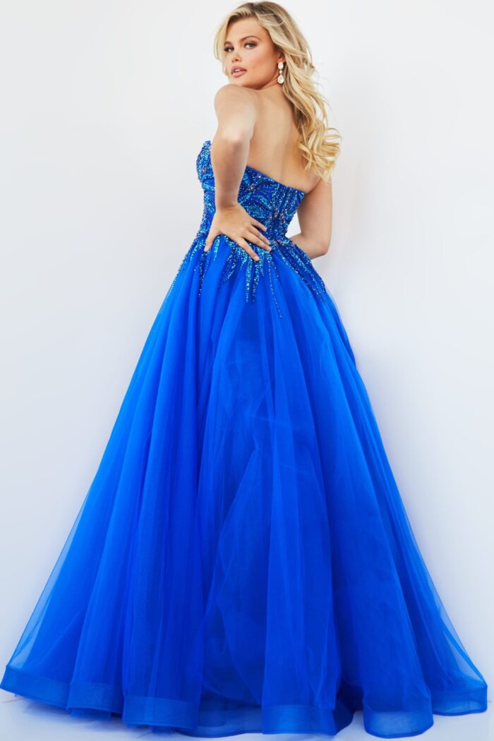 Model showcasing the back of Jovani 07946 royal blue ball gown