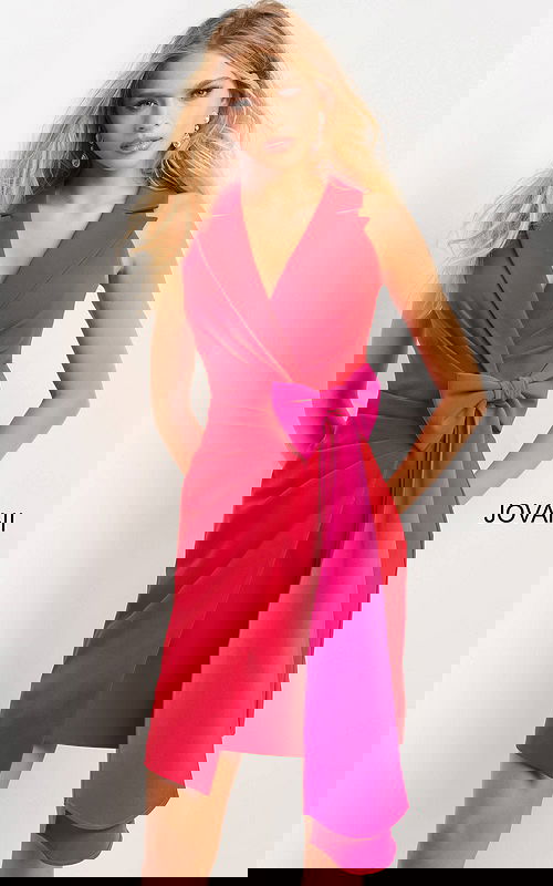 model wearing Jovani 07961 red dress with fuchsia bow detail, front view