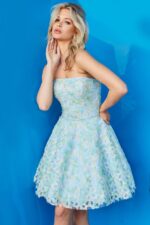 Model wearing 07965 cocktail dress, front pose, in a multi-colored floral pattern.