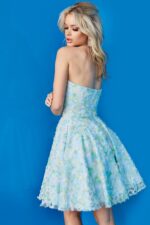 Model wearing 07965 cocktail dress, detailed back view, in a multi-colored floral pattern.
