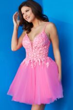 Model wearing Jovani 08273 hot pink dress, smiling.