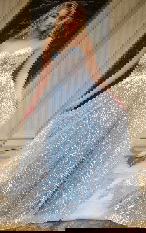 Model wearing Jovani 08417 blue A-line dress front view