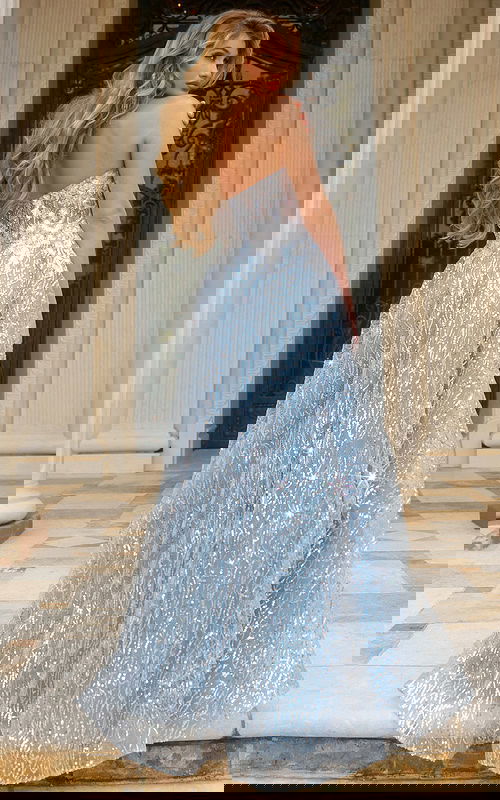 Model wearing Jovani 08417 blue dress back view