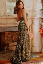 Model wearing Jovani 08459 green floral sequin gown, back view.