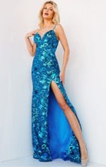 Model in Jovani 08459 royal blue floral sequin gown.