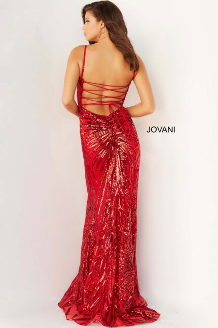 Back view of model in Jovani 08481 red gown with sequin details and lace-up design.