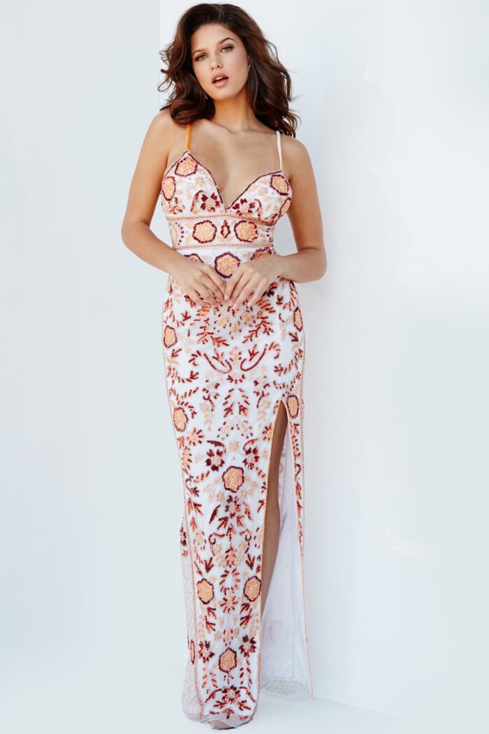 Model wearing Jovani 08546 white dress with floral embroidery and side slit.