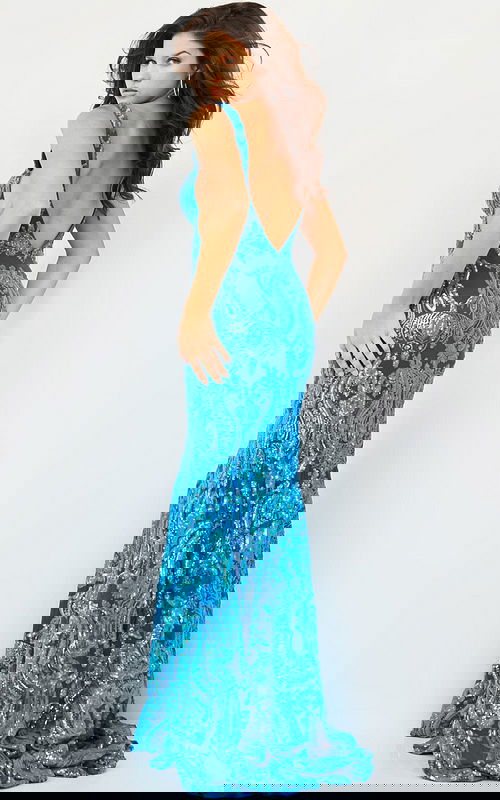 Model showing Jovani 08646 Royal gown from the back, highlighting open back design and sequined embellishments.