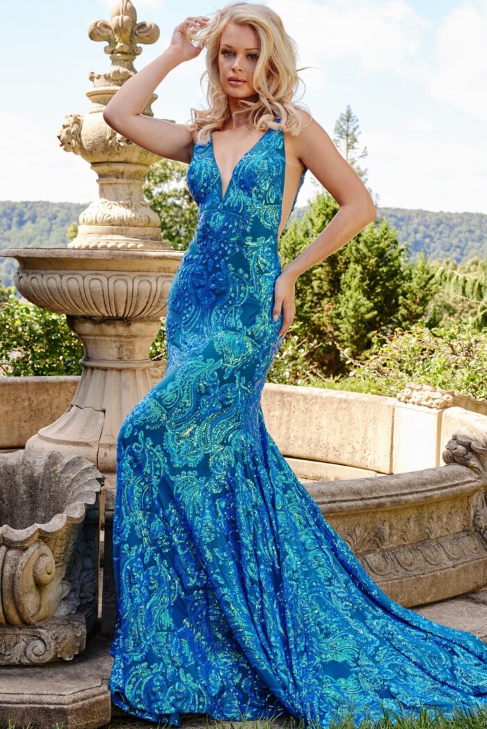 Model in Jovani 08646 Royal gown with sequin details and v-neckline.
