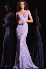 Model in Jovani 08646 Lilac gown with v-neck and flowing mermaid silhouette.