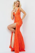 Model wearing Jovani 08674 dress in orange showcasing a high slit and plunging neckline.