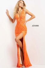 Model in Jovani 08674 orange dress featuring a plunging neckline and high slit.
