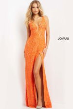 Model showcasing Jovani 08674 orange dress, highlighting plunging neckline and lace.