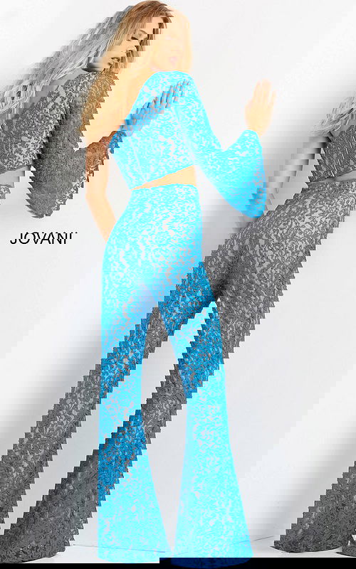 Model wearing Jovani 08693 blue lace set highlighting back design.