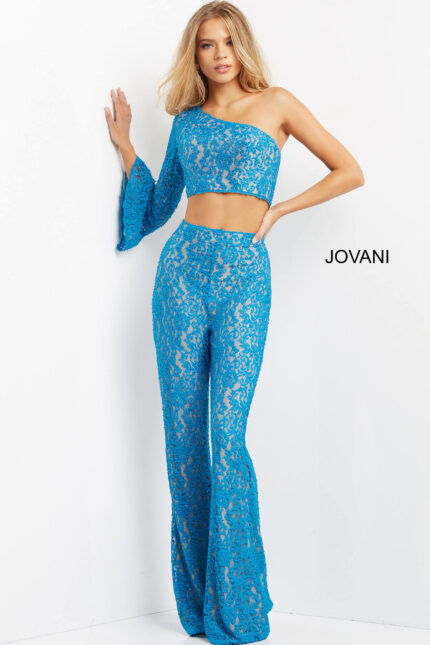Model wearing Jovani 08693 blue lace ensemble with asymmetrical neckline.