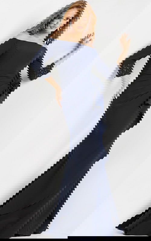 Model wearing Jovani 08699 navy dress with beaded sleeves, front view.