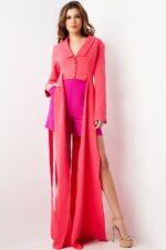 Model in Jovani 09127, striking a pose with pocket detail visible.