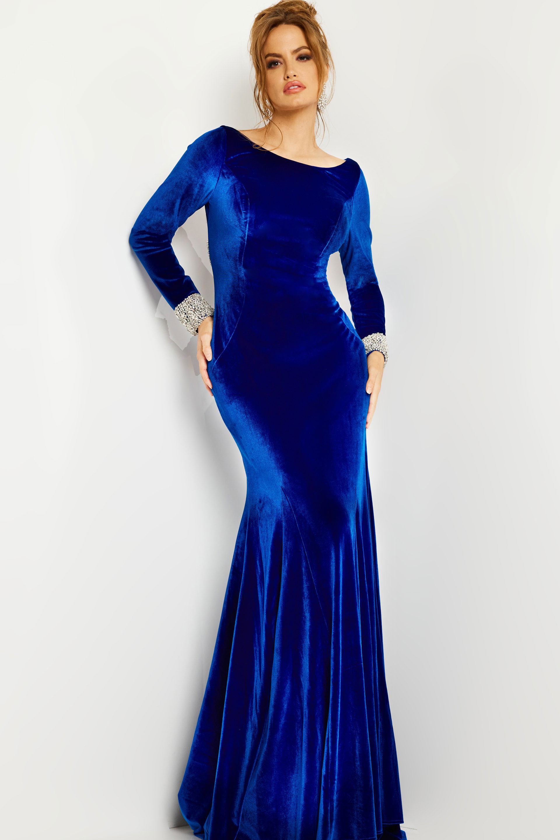 09139-ROYAL-2017.jpg Model wearing Jovani 09139 in royal, front view with bateau neckline and embellished cuffs.